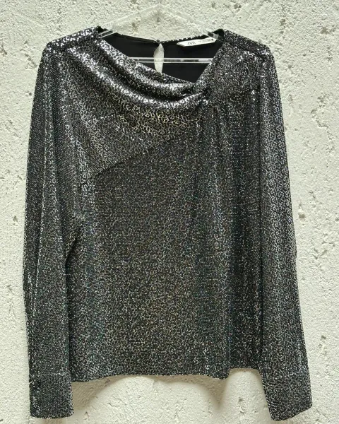 Blusa plateada de fiesta