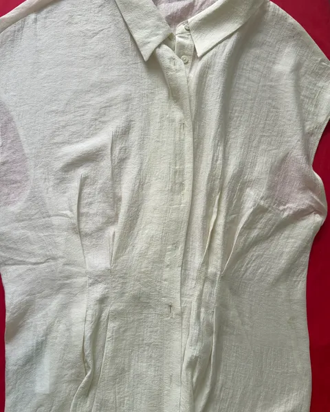 Blusa casual MNG color crema