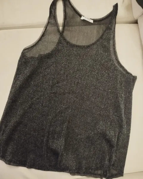 Blusa transparente brillante